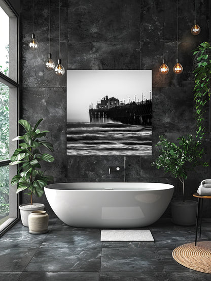"Moonlighting" Oceanside California fine art photography by Craig Meyer showing moonlight coastal scene in black and white photograph of a Oceanside pier over water, displayed as a square wall art print in a modern bathroom